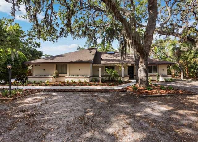 Property at 4916 Hidden Oaks Trl, Sarasota, FL 34232, 5 beds, 3 baths