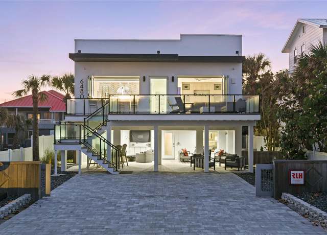 Property at 6480 S Atlantic Ave, New Smyrna Beach, FL 32169, 6 beds, 4.5 baths