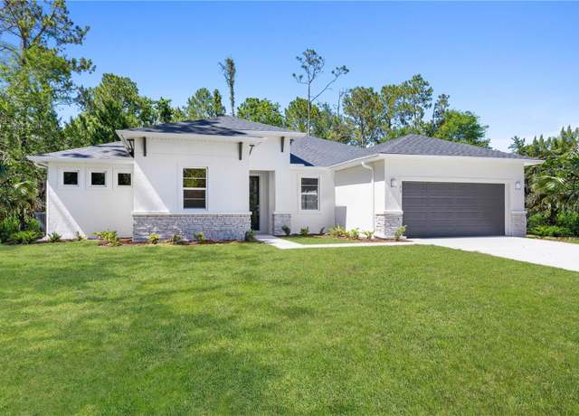 Property at 74 Uhl Path, Palm Coast, FL 32164, 4 beds, 3 baths