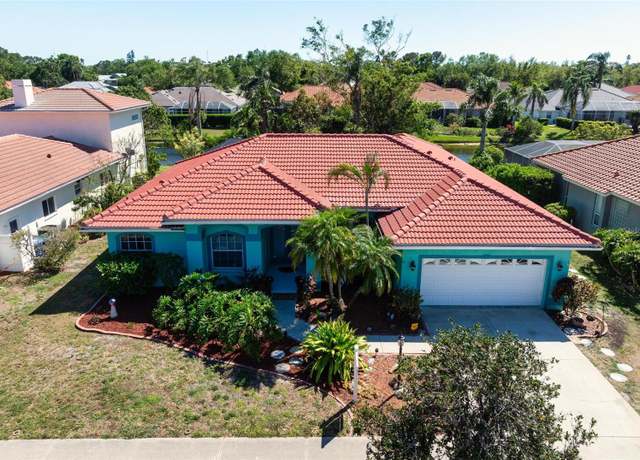 Property at 4464 Mcintosh Lake Ave, Sarasota, FL 34233, 4 beds, 3 baths