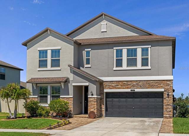 Property at 8780 Flourish Dr, Land O Lakes, FL 34637, 5 beds, 3.5 baths