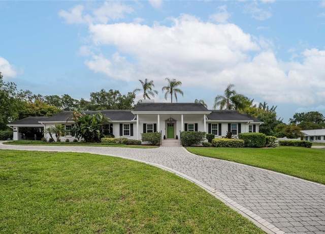 Property at 1425 Hallam Dr, Lakeland, FL 33813, 4 beds, 3.5 baths