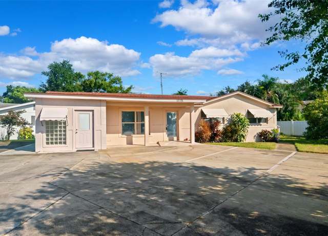 Property at 10701 Village Green Ave, Seminole, FL 33772, 3 beds, 1.5 baths