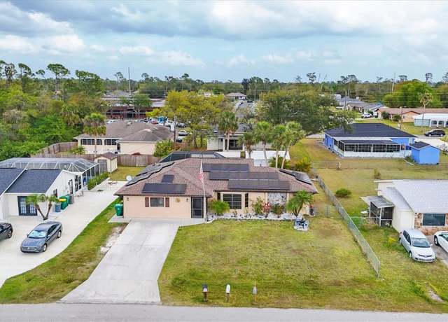 Property at 392 Yeager St, Port Charlotte, FL 33954, 3 beds, 2.5 baths