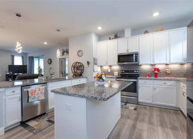Property at 65 Oakleaf Way, Palm Coast, FL 32137, 4 beds, 2 baths