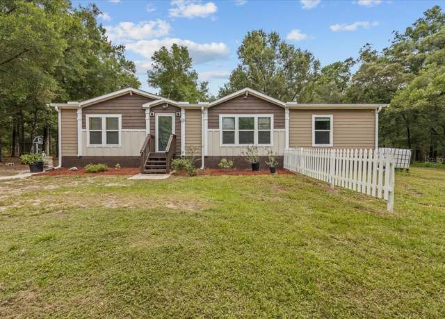 Property at 12091 NE 111th Ave, Archer, FL 32618, 3 beds, 2 baths