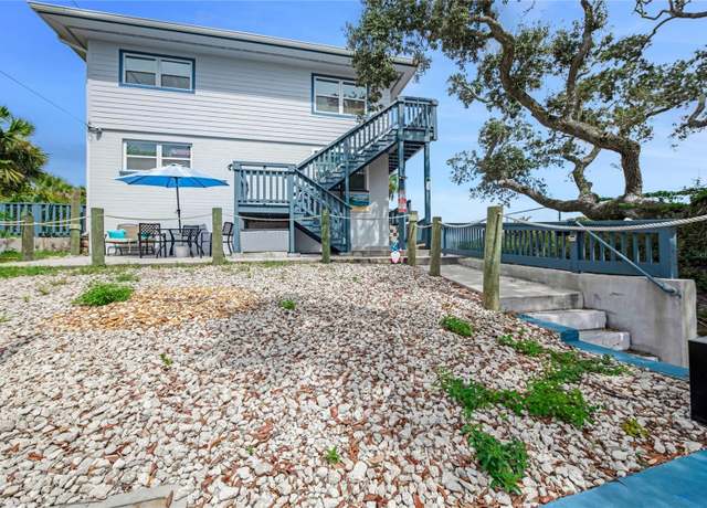 Property at 112 N Peninsula Dr, Daytona Beach, FL 32118, 5 beds, 4 baths