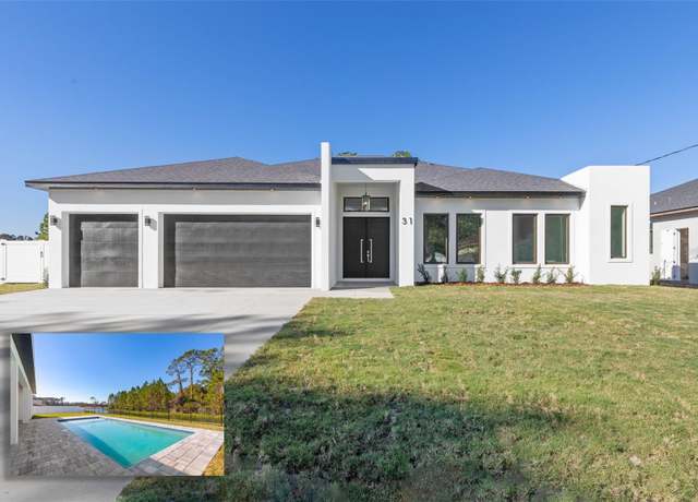 Property at 31 Lake Success Dr, Palm Coast, FL 32137, 4 beds, 3 baths