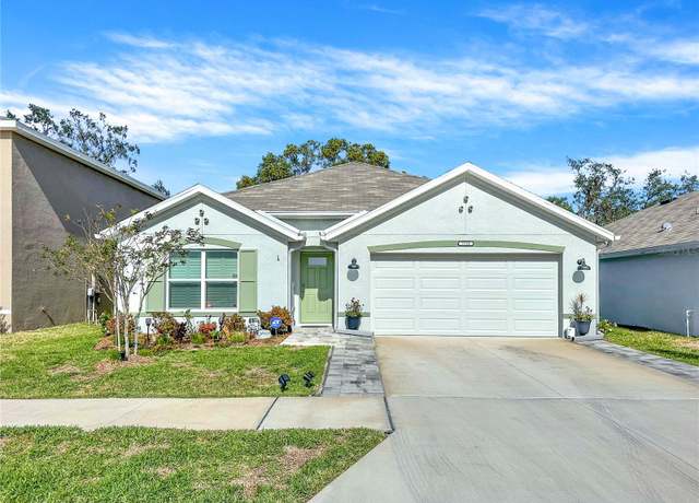 Property at 7729 Rosewood Garden Loop, Tampa, FL 33637, 4 beds, 2 baths