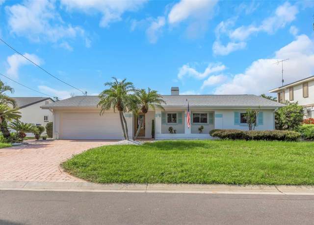 Property at 220 Driftwood Dr S, Palm Harbor, FL 34683, 4 beds, 2 baths