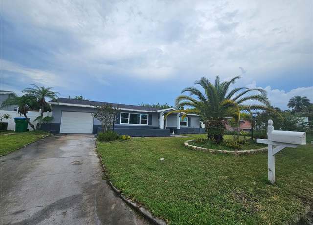 Property at 4943 Lake Charles Dr N, Kenneth City, FL 33709, 3 beds, 2 baths