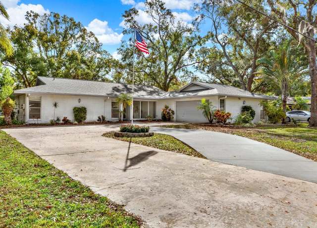 Property at 3320 Lake Padgett Dr, Land O Lakes, FL 34639, 4 beds, 2 baths