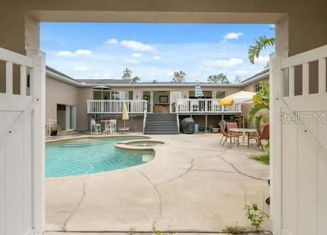 Property at 7941 Sycamore Dr, New Port Richey, FL 34654, 4 beds, 4 baths