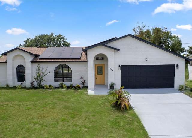 Property at 648 Tradewinds Dr, Deltona, FL 32738, 4 beds, 2 baths