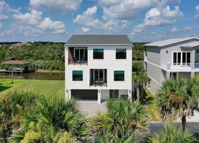 Property at 3538 N Ocean Shore Blvd, Palm Coast, FL 32137, 5 beds, 4.5 baths