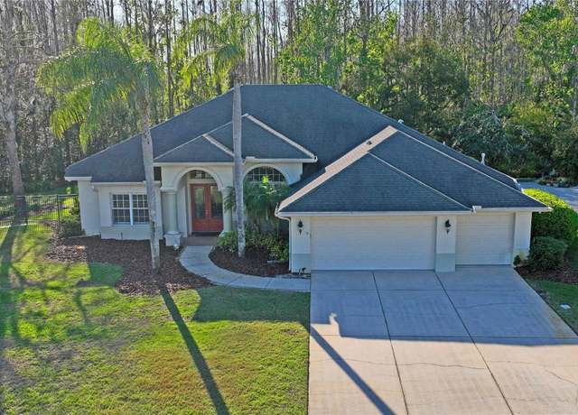 Property at 1405 Kensington Woods Dr, Lutz, FL 33549, 4 beds, 3 baths