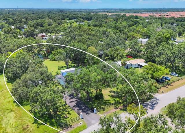 Property at 2503 W Lake Dr, Wimauma, FL 33598, 4 beds, 3.5 baths