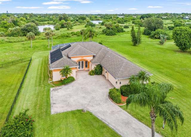 Property at 716 Bell Blvd S, Lehigh Acres, FL 33974, 3 beds, 3 baths