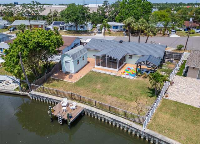 Property at 8702 Driftwood Dr, Tampa, FL 33615, 3 beds, 2 baths