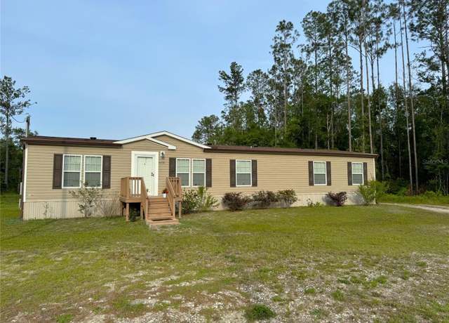 Property at 6931 NE 77th Ave, Bronson, FL 32621, 5 beds, 3 baths