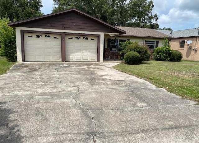 Property at 12314 Virginia Dr, Leesburg, FL 34788, 3 beds, 2 baths