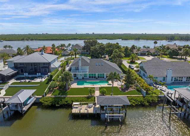 Property at 1216 Commodore Dr, New Smyrna Beach, FL 32168, 4 beds, 4.5 baths