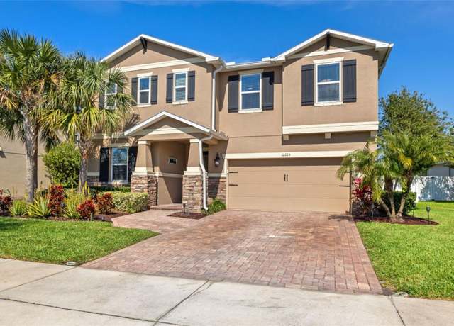 Property at 12225 Lake Blvd, New Port Richey, FL 34655, 5 beds, 4.5 baths