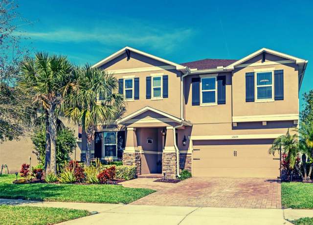 Property at 12225 Lake Blvd, New Port Richey, FL 34655, 5 beds, 4.5 baths