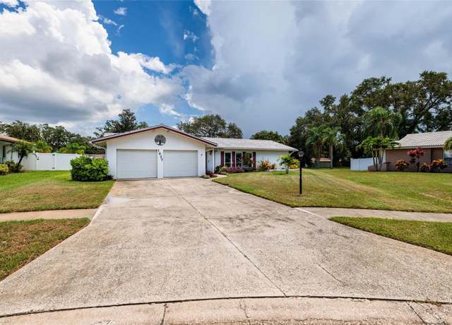 Property at 1027 Grovewood Ct, Clearwater, FL 33764, 4 beds, 3 baths