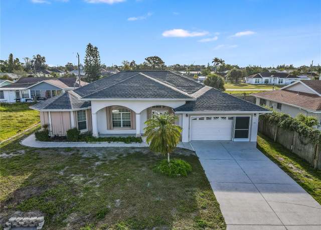 Property at 217 San Carlos Ave, North Port, FL 34287, 3 beds, 3 baths