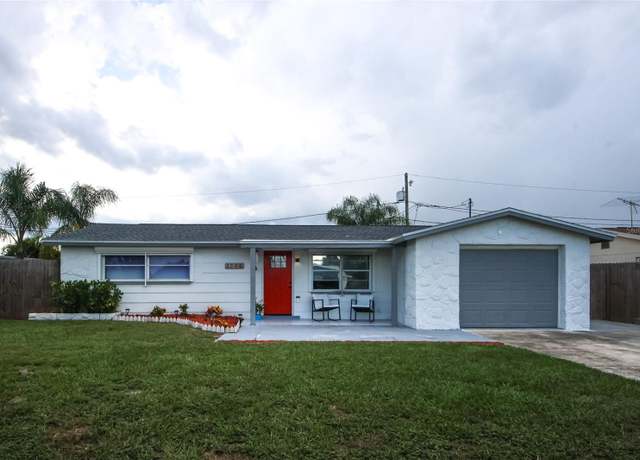 Property at 1206 Tamarac Dr, Holiday, FL 34690, 4 beds, 3 baths