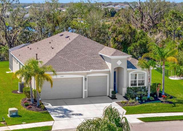 Property at 12809 Rainwashed Loop, Parrish, FL 34219, 4 beds, 3 baths