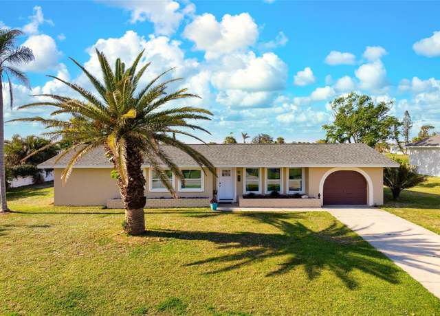Property at 84 Caddy Rd, Rotonda West, FL 33947, 4 beds, 2 baths