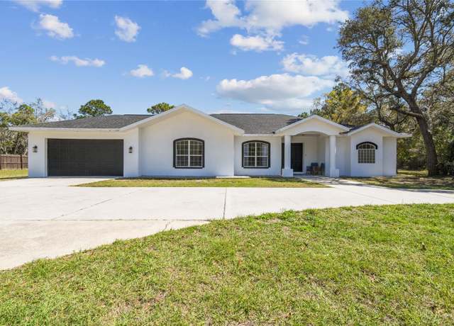 Property at 18214 Ozark Dr, Hudson, FL 34667, 4 beds, 3 baths