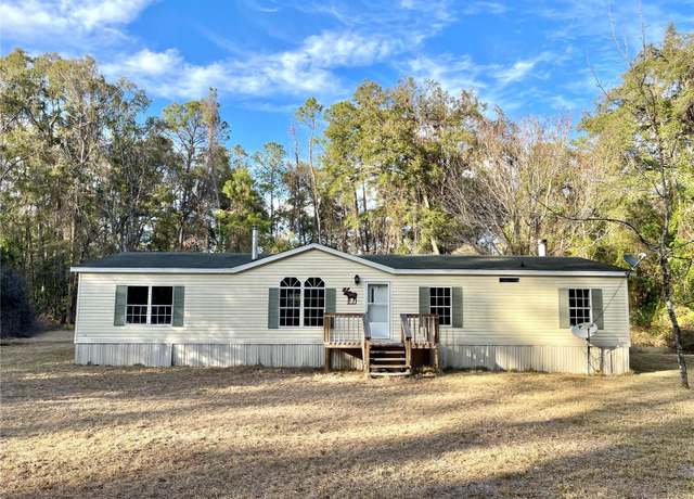 Property at 765 SE Maid Marion Ln, High Springs, FL 32643, 3 beds, 2 baths