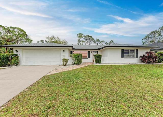 Property at 1052 Hinton St, Port Charlotte, FL 33952, 3 beds, 2.5 baths