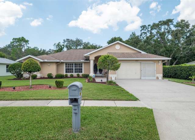 Property at 1007 Archway Dr, Spring Hill, FL 34608, 3 beds, 2 baths