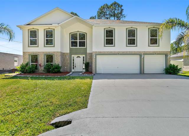 Property at 34 Lloleeta Path, Palm Coast, FL 32164, 6 beds, 5.5 baths