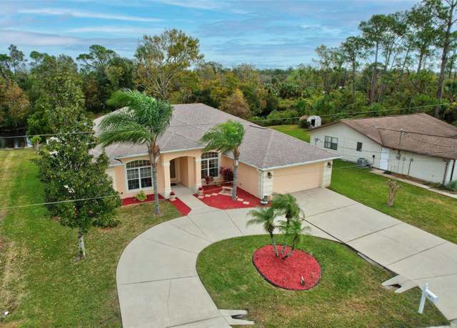 Property at 77 Perthshire Ln, Palm Coast, FL 32164, 4 beds, 2 baths