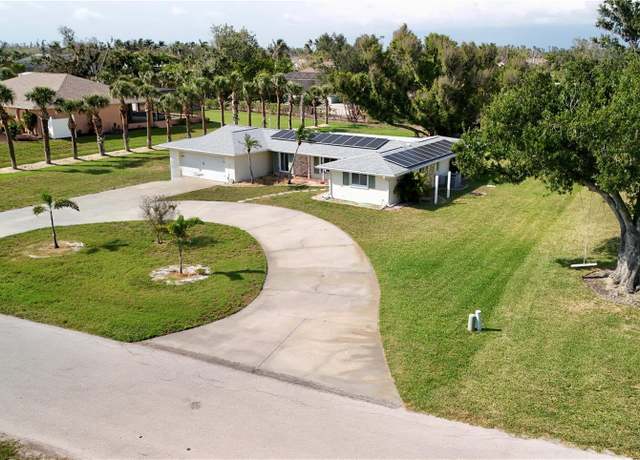 Property at 310 Green Dolphin Dr, Placida, FL 33946, 2 beds, 2 baths