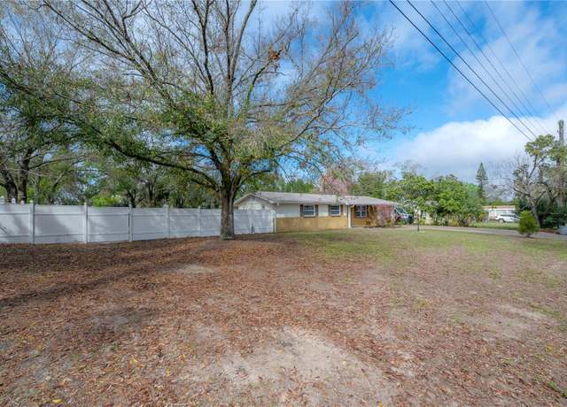 Property at 9618 N 55th St, Temple Terrace, FL 33617, 3 beds, 3 baths