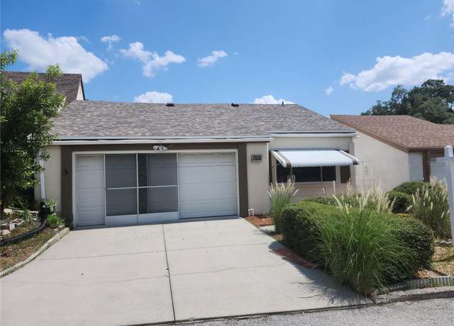 Property at 7832 Fox Den Row, Hudson, FL 34667, 4 beds, 2 baths