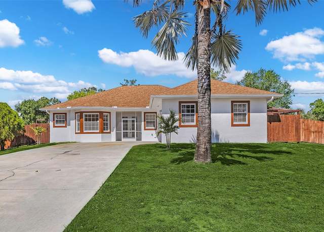 Property at 1417 5th Ave, Lehigh Acres, FL 33972, 4 beds, 3.5 baths