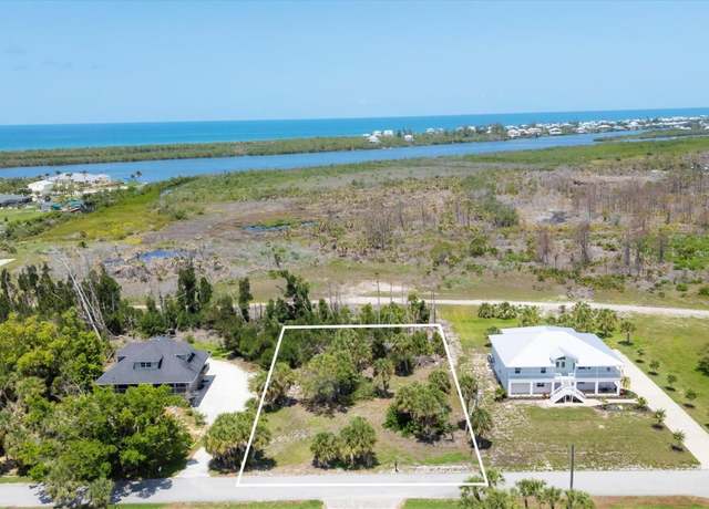 Property at 55 Green Dolphin Dr N, Placida, FL 33946