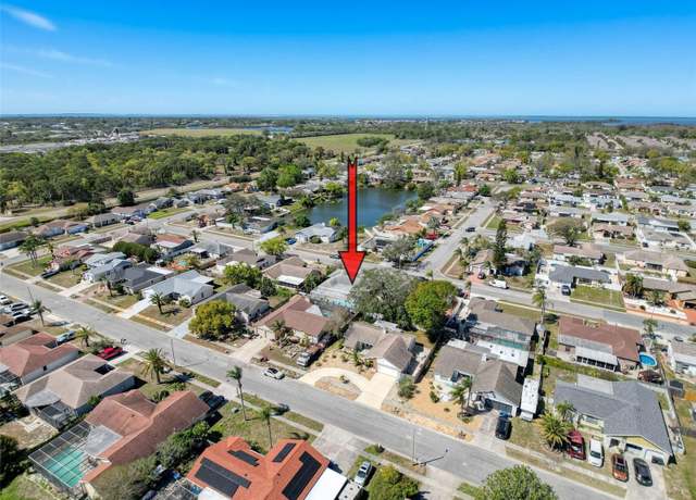 Property at 1102 Springtime Dr, Holiday, FL 34691, 3 beds, 2 baths