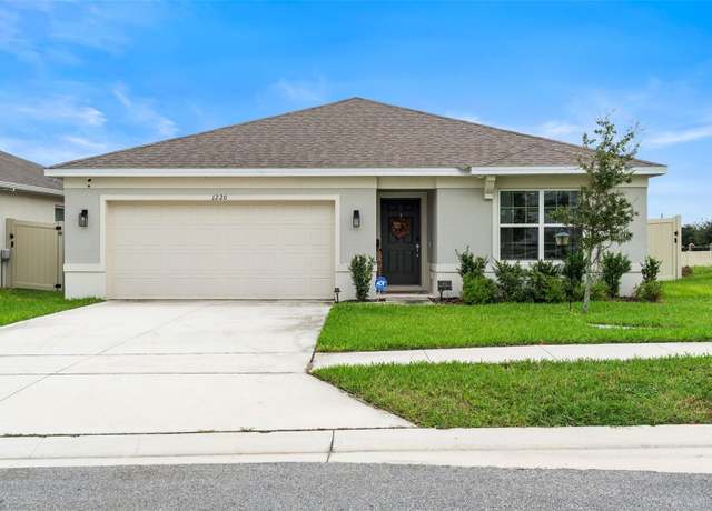 Property at 1220 Sugarwood St, Davenport, FL 33837, 4 beds, 2 baths