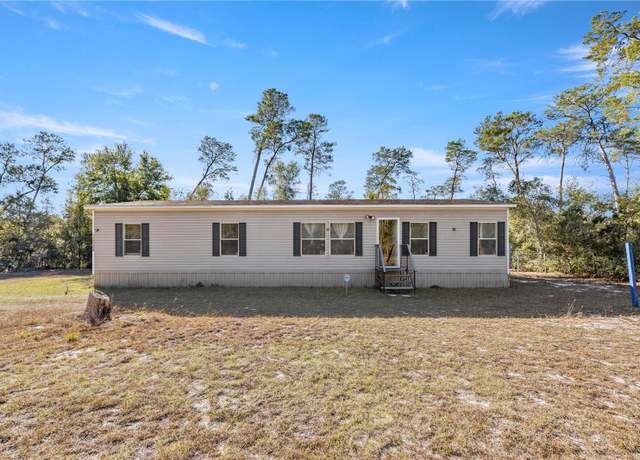 Property at 15568 NE 238th St, Fort Mc Coy, FL 32134, 4 beds, 2 baths