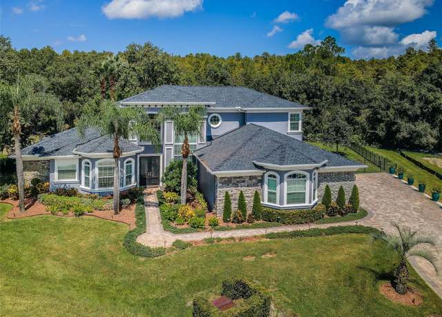Property at 180 Keystone Palms Blvd, Tarpon Springs, FL 34688, 5 beds, 3.5 baths