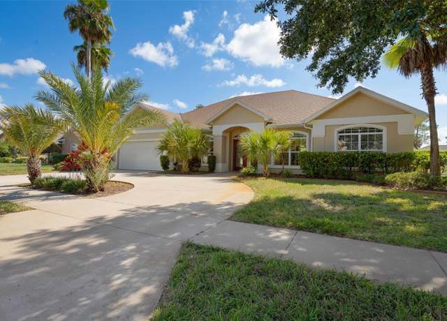 Property at 8 Lakeside Pl W, Palm Coast, FL 32137, 4 beds, 3 baths
