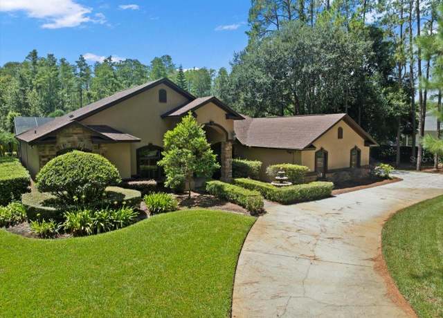 Property at 412 Pine Bluff Dr, Lutz, FL 33549, 4 beds, 3 baths